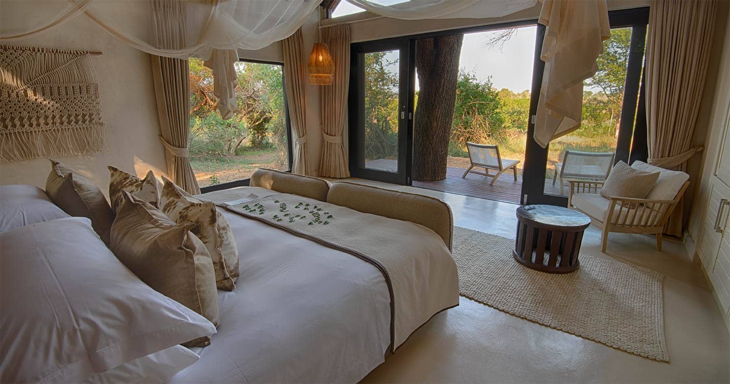 Lion Sands River Lodge bedroom in Sabi Sands