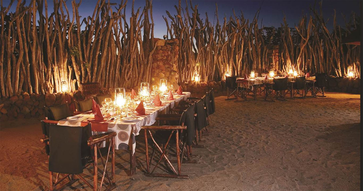 Enjoy a romantic dinner in the boma at Leopard Hills